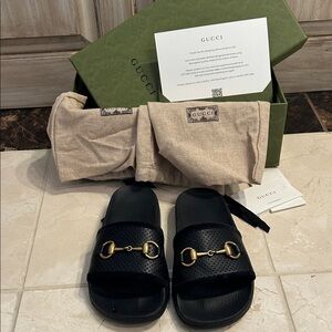 Gucci Black Slide Sandals with Gold Accents